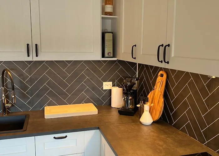 Basstuvaga Ferieleilighet, Sogne I Kristiansand